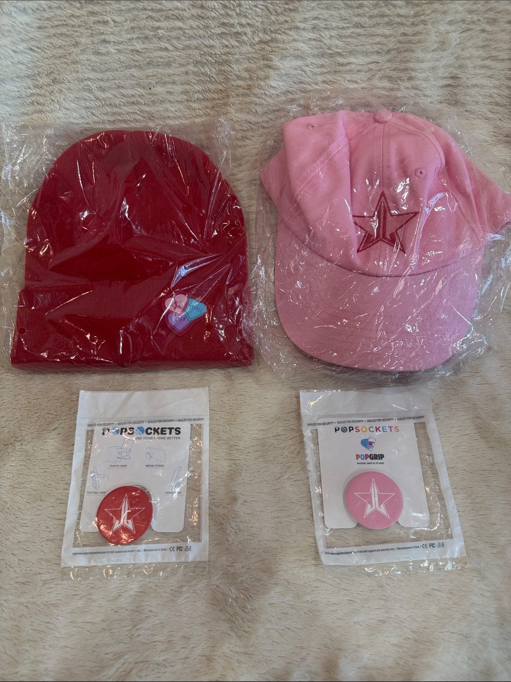 Jeffree Star Red & Pink PopSocket with red beanie and pink baseball cap.
